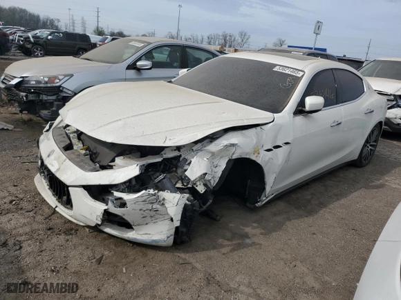 2014 Maserati Ghibli S Q4 with VIN ZAM57RTA2E1083387, listed as a Copart auction lot 53621465 with 0 mi miles and Salvage Title. Bid and sale history available at carsss.com. Image 1.