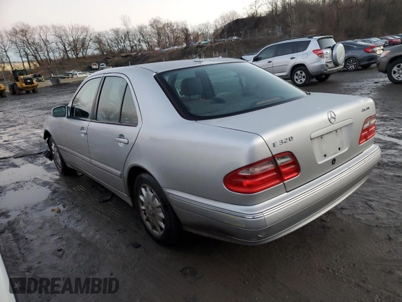 2002 Mercedes-Benz E-Class with VIN WDBJF82J32X066803, listed as a Copart auction lot 85474614 with 77,358 mi miles and Salvage Title. Bid and sale history available at carsss.com. Image 2.