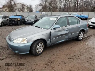 1999 Honda Civic EX z VIN 2HGEJ8646XH550886, wystawiony jako Copart lot #41465115 z przebiegiem 78 693 mil mil oraz Szkoda całkowita • Salvage title. Historia ofert i sprzedaży dostępna na DreamBid. Obrazek 1.