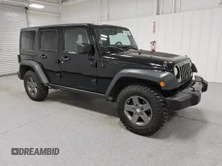 2011 Jeep Wrangler Unlimited Rubicon with VIN 1J4HA6H16BL551870, listed as a Copart auction lot 56754715 with 154,890 mi miles and Clean title. Bid and sale history available at DreamBid. Image 4.