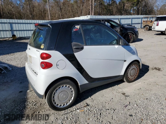 2012 Smart fortwo Pure z VIN WMEEJ3BA1CK559092, wystawiony jako Copart lot #85506924 z przebiegiem 47 806 mil mil oraz Szkoda całkowita • Salvage title. Historia ofert i sprzedaży dostępna na DreamBid. Obrazek 3.