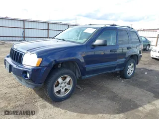 2005 Jeep Grand Cherokee Laredo with VIN 1J8GR48K45C534005, listed as a IAAI auction lot 41759692 with 211,566 mi miles. Bid and sale history available at carsss.com. Image 2.