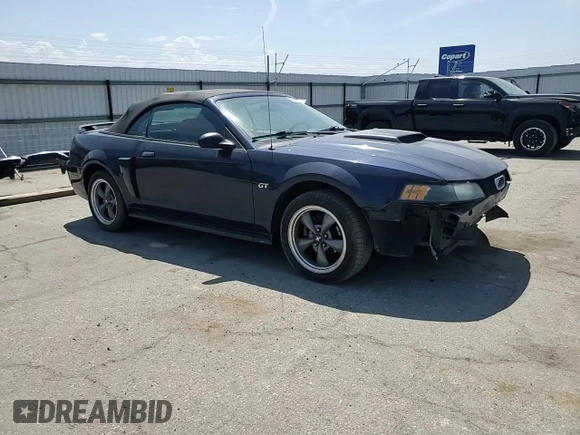 2002 Ford Mustang GT Deluxe z VIN 1FAFP45X22F101551, wystawiony jako Copart lot #55184645 z przebiegiem 137 971 mil mil oraz Szkoda całkowita • Salvage title. Historia ofert i sprzedaży dostępna na DreamBid. Obrazek 14.