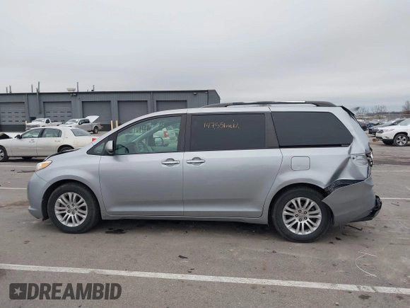 2011 Toyota Sienna XLE AAS with VIN 5TDYK3DC5BS150527, listed as a IAAI auction lot 41143189 with 147,551 mi miles and . Bid and sale history available at DreamBid. Image 14.