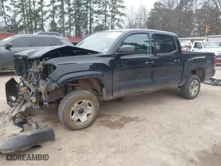 2023 Toyota Tacoma 4WD SR with VIN 3TYCZ5AN8PT132624, listed as a IAAI auction lot 41236047 with 47,273 mi miles. Bid and sale history available at carsss.com. Image 2.