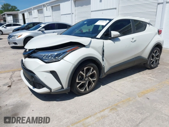 2021 Toyota C-HR LE with VIN JTNKHMBX8M1104427, listed as a IAAI auction lot 41948234 with 24,415 mi miles. Bid and sale history available at carsss.com. Image 17.
