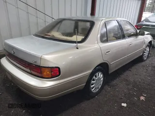 1994 Toyota Camry LE with VIN 4T1SK12E3RU863068, listed as a IAAI auction lot 41246198 with 109,786 mi miles. Bid and sale history available at carsss.com. Image 4.