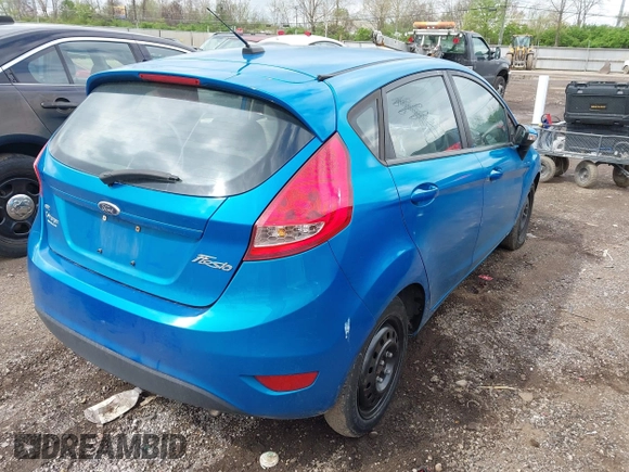 2013 Ford Fiesta SE with VIN 3FADP4EJ0DM158451, listed as a IAAI auction lot 42083743 with 111,919 mi miles. Bid and sale history available at carsss.com. Image 4.
