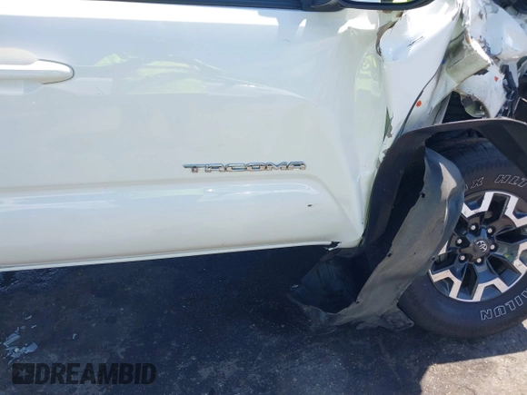 2020 Toyota Tacoma SR5 z VIN 5TFCZ5AN5LX231157, wystawiony jako IAAI lot #42045534 z przebiegiem 84 099 mil mil oraz . Historia ofert i sprzedaży dostępna na DreamBid. Obrazek 6.