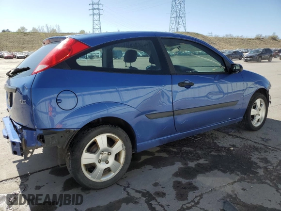 2004 Ford Focus ZX3 with VIN 3FAFP313X4R123879, listed as a Copart auction lot 54052055 with 174,692 mi miles and Salvage Title. Bid and sale history available at carsss.com. Image 3.