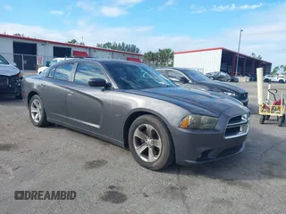 2013 Dodge Charger RT with VIN 2C3CDXCT1DH617932, listed as a IAAI auction lot 41359405 with 126,612 mi miles. Bid and sale history available at carsss.com. Image 1.