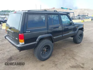 2000 Jeep Cherokee z VIN 1J4FF48S2YL190863, wystawiony jako IAAI lot #42820115 z przebiegiem 133 296 mil mil oraz . Historia ofert i sprzedaży dostępna na DreamBid. Obrazek 4.