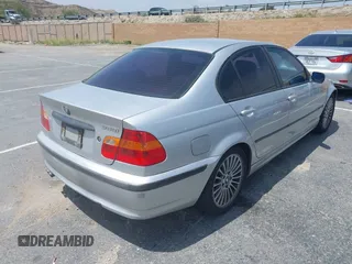 2002 BMW 3 Series 325i with VIN WBAET37452NG73105, listed as a IAAI auction lot 42105774 with 202,852 mi miles. Bid and sale history available at carsss.com. Image 4.