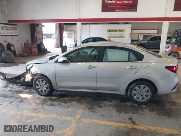 2022 Kia Rio S with VIN 3KPA24AD2NE473517, listed as a IAAI auction lot 41704769 with 52,810 mi miles. Bid and sale history available at carsss.com. Image 14.