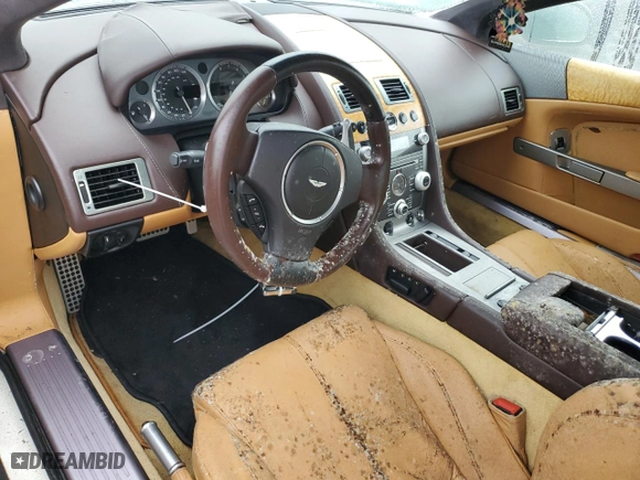 2011 Aston Martin DB9 with VIN SCFFDAAE8BGA13186, listed as a Copart auction lot 74703544 with 0 mi miles and Salvage Title. Bid and sale history available at carsss.com. Image 8.