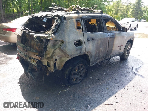 2018 Jeep Compass Trailhawk with VIN 3C4NJDDB5JT130317, listed as a IAAI auction lot 42470070 with 95,000 mi miles and . Bid and sale history available at DreamBid. Image 4.