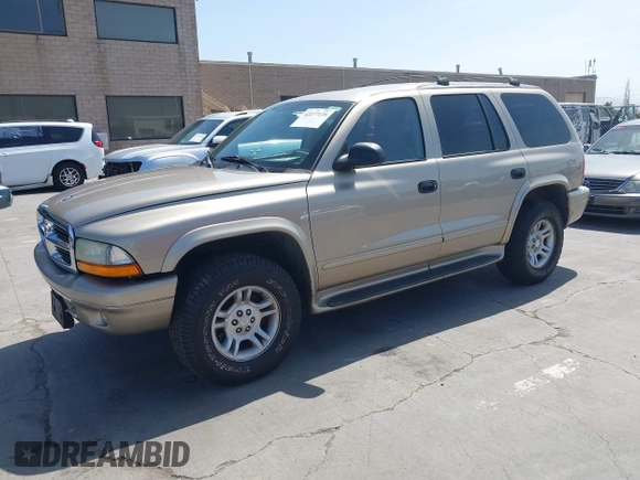 2003 Dodge Durango SLT z VIN 1D4HS48N43F517701, wystawiony jako IAAI lot #42277135 z przebiegiem 135 521 mil mil oraz . Historia ofert i sprzedaży dostępna na DreamBid. Obrazek 2.