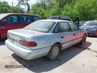 1993 Ford Taurus with VIN 1FACP52U8PA140927, listed as a IAAI auction lot 42189786 with 56,327 mi miles and . Bid and sale history available at DreamBid. Image 4.