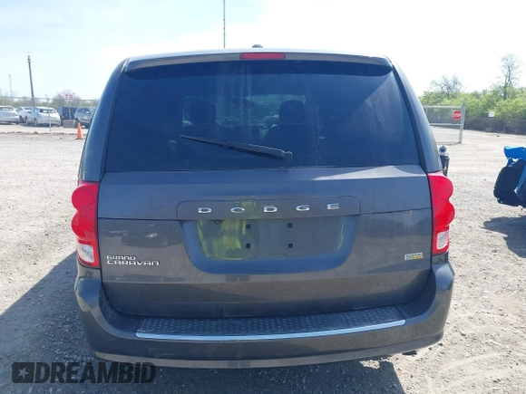 2017 Dodge Grand Caravan SE z VIN 2C4RDGBG1HR725915, wystawiony jako IAAI lot #42070982 z przebiegiem 134 659 mil mil oraz . Historia ofert i sprzedaży dostępna na DreamBid. Obrazek 16.