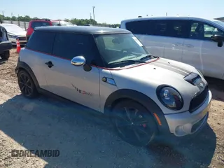 2013 MINI Hardtop S with VIN WMWSV3C50DT389419, listed as a IAAI auction lot 42027558 with 160,453 mi miles and . Bid and sale history available at DreamBid. Image 1.