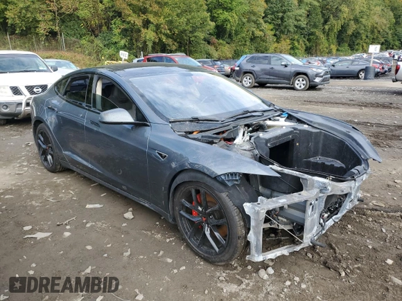 2014 Tesla Model S 60 with VIN 5YJSA1H14EFP28471, listed as a Copart auction lot 73715834 with 99,442 mi miles and Clean Title. Bid and sale history available at DreamBid. Image 4.