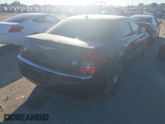 2006 Chrysler 300 C with VIN 2C3LA63H56H246663, listed as a IAAI auction lot 40894432 with 145,629 mi miles. Bid and sale history available at carsss.com. Image 4.