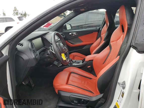 2020 BMW 2 Series M235i xDrive with VIN WBA13AL07L7G06064, listed as a Copart auction lot 42617345 with 67,338 mi miles and Salvage Title. Bid and sale history available at carsss.com. Image 7.