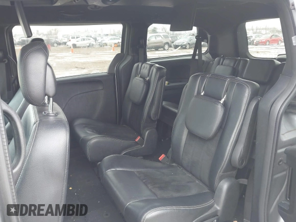 2014 Dodge Grand Caravan SXT with VIN 2C4RDGCGXER308657, listed as a IAAI auction lot 41602422 with 200,643 mi miles and . Bid and sale history available at DreamBid. Image 8.