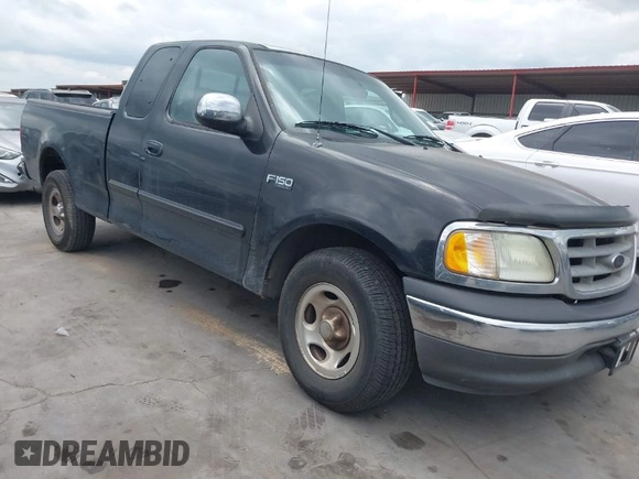 2002 Ford F-150 XL with VIN 1FTRX17202NA21470, listed as a IAAI auction lot 42098554 with 149,840 mi miles. Bid and sale history available at carsss.com. Image 1.