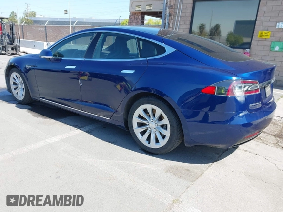 2016 Tesla Model S 90D with VIN 5YJSA1E25GF157220, listed as a IAAI auction lot 42003019 with 130,540 mi miles and . Bid and sale history available at DreamBid. Image 3.
