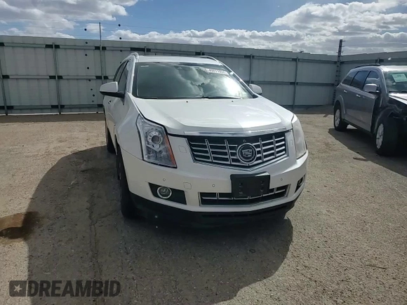 2014 Cadillac SRX Premium Collection z VIN 3GYFNGE32ES573872, wystawiony jako Copart lot #49871955 z przebiegiem 119 362 mil mil oraz Szkody całkowita. Historia ofert i sprzedaży dostępna na DreamBid. Obrazek 12.