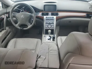 2006 Acura RL z VIN JH4KB16526C005279, wystawiony jako Copart lot #57917835 z przebiegiem 145 737 mil mil oraz Szkody całkowita. Historia ofert i sprzedaży dostępna na DreamBid. Obrazek 8.