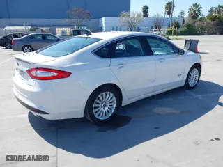 2013 Ford Fusion Energi Titanium with VIN 3FA6P0SU3DR273676, listed as a IAAI auction lot 41777822 with 189,283 mi miles. Bid and sale history available at carsss.com. Image 4.