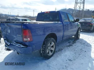 2014 Ram 1500 Sport with VIN 1C6RR7HT3ES362184, listed as a IAAI auction lot 41273983 with 149,833 mi miles and . Bid and sale history available at DreamBid. Image 4.