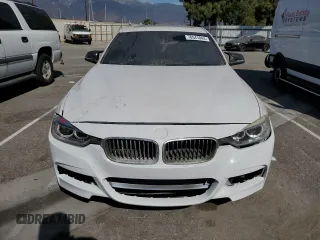 2014 BMW 3 Series 335i with VIN WBA3A9C50EF479026, listed as a Copart auction lot 76541044 with 115,192 mi miles and Clean Title. Bid and sale history available at carsss.com. Image 5.