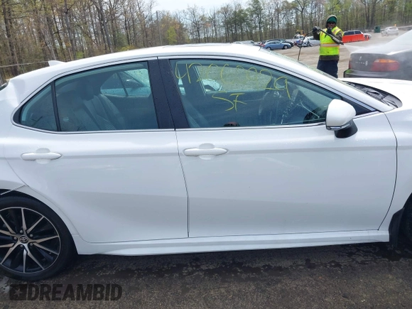 2023 Toyota Camry SE with VIN 4T1G11AK7PU771765, listed as a IAAI auction lot 42060929 with 39,407 mi miles and . Bid and sale history available at DreamBid. Image 13.