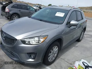2014 Mazda CX-5 Touring with VIN JM3KE2CY3E0429025, listed as a IAAI auction lot 41680713 with 113,065 mi miles. Bid and sale history available at carsss.com. Image 2.