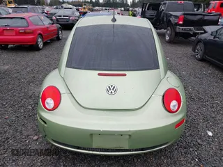 2006 Volkswagen New Beetle Coupe with VIN 3VWRW31C06M402944, listed as a IAAI auction lot 41858922 with 97,518 mi miles. Bid and sale history available at carsss.com. Image 16.