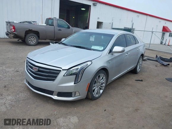 2019 Cadillac XTS Luxury with VIN 2G61M5S39K9119352, listed as a IAAI auction lot 42345653 with 94,938 mi miles and . Bid and sale history available at DreamBid. Image 2.