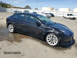 2022 Tesla Model 3 z VIN 5YJ3E1EA5NF189274, wystawiony jako Copart lot #57160765 z przebiegiem 127 420 mil mil oraz Szkoda całkowita • Salvage title. Historia ofert i sprzedaży dostępna na DreamBid. Obrazek 4.