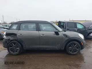 2014 MINI Countryman S z VIN WMWZC5C55EWP38431, wystawiony jako IAAI lot #41710523 z przebiegiem 153 441 mil mil oraz . Historia ofert i sprzedaży dostępna na DreamBid. Obrazek 13.