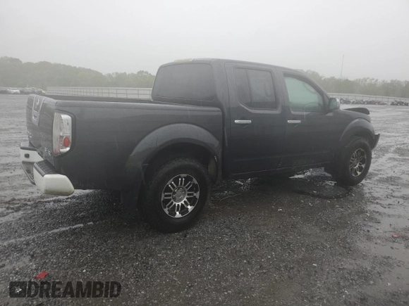 2010 Nissan Frontier SE with VIN 1N6AD0EV5AC407533, listed as a Copart auction lot 52020365 with 119,041 mi miles and Salvage title. Bid and sale history available at DreamBid. Image 3.