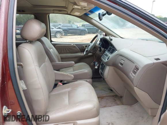 2002 Toyota Sienna LE with VIN 4T3ZF13C12U437425, listed as a IAAI auction lot 41157987 with 200,309 mi miles. Bid and sale history available at carsss.com. Image 5.