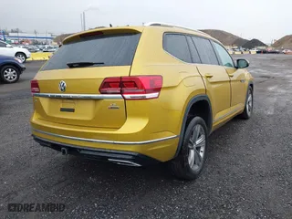 2018 Volkswagen Atlas 3.6L V6 SEL with VIN 1V2RR2CA0JC557938, listed as a IAAI auction lot 41964285 with 53,991 mi miles. Bid and sale history available at carsss.com. Image 4.