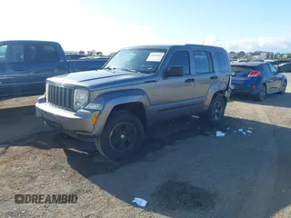 2012 Jeep Liberty Sport with VIN 1C4PJLAK2CW190883, listed as a IAAI auction lot 42066260 with 180,715 mi miles and . Bid and sale history available at carsss.com. Image 2.