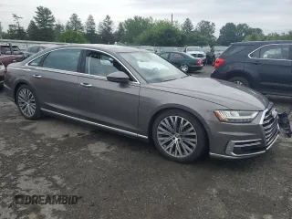 2019 Audi A8 with VIN WAU8DAF85KN001836, listed as a Copart auction lot 62670185 with 44,661 mi miles and Salvage title. Bid and sale history available at DreamBid. Image 4.