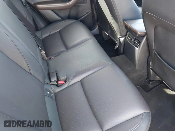 2023 Mazda CX-30 S Premium with VIN 3MVDMBDM7PM528297, listed as a IAAI auction lot 41637542 with 48,935 mi miles and . Bid and sale history available at DreamBid. Image 8.