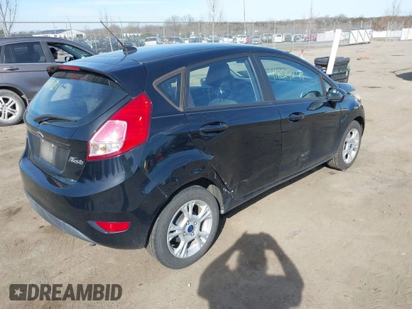 2016 Ford Fiesta SE with VIN 3FADP4EJ5GM153945, listed as a IAAI auction lot 41829241 with 157,597 mi miles. Bid and sale history available at carsss.com. Image 4.