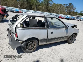 1990 Geo Metro z VIN 2C1MR2466L6018173, wystawiony jako Copart lot #72966054 z przebiegiem 88 980 mil mil oraz Szkody całkowita. Historia ofert i sprzedaży dostępna na DreamBid. Obrazek 3.