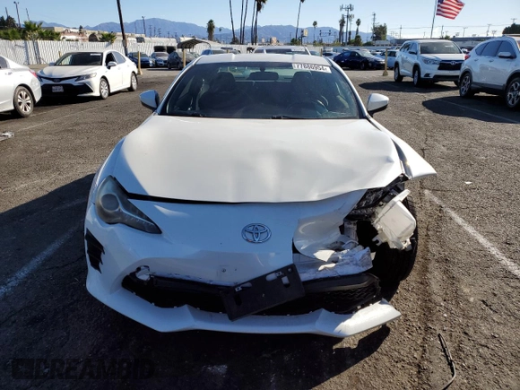 2017 Toyota 86 with VIN JF1ZNAA11H8710596, listed as a Copart auction lot 77886954 with 64,272 mi miles and Salvage Title. Bid and sale history available at carsss.com. Image 5.